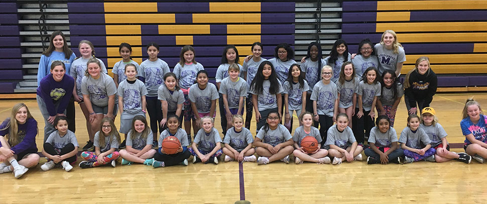 Youth basketball team wearing custom team t-shirts