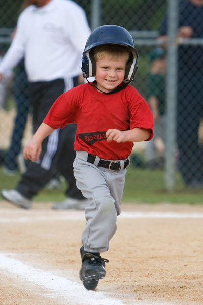 Young boy playing baseball